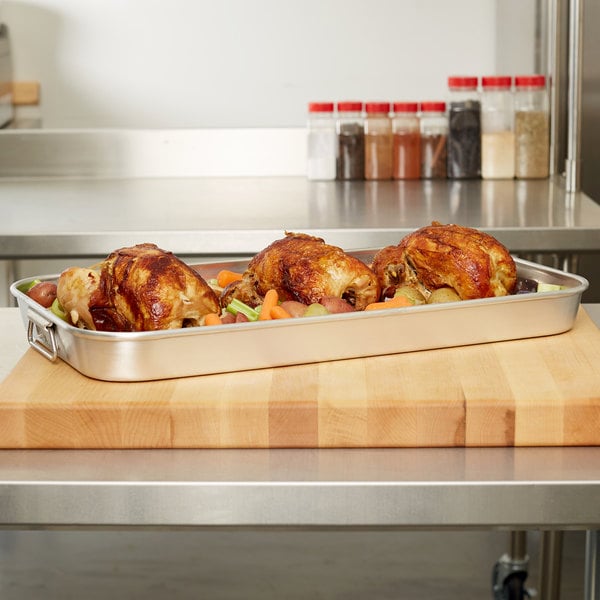 Vollrath 68253 Wear-Ever 8.9375 Qt. Aluminum Baking and Roasting Pan with Handles - 22 7/8" x 13 1/2" x 2"